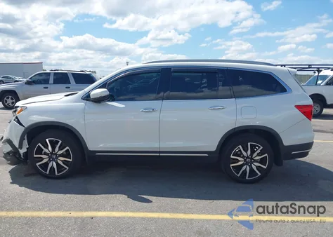 2021 Honda Pilot 2Wd Touring 8 Passenger from USA, damaged, VIN 5FNYF5H92MB001689